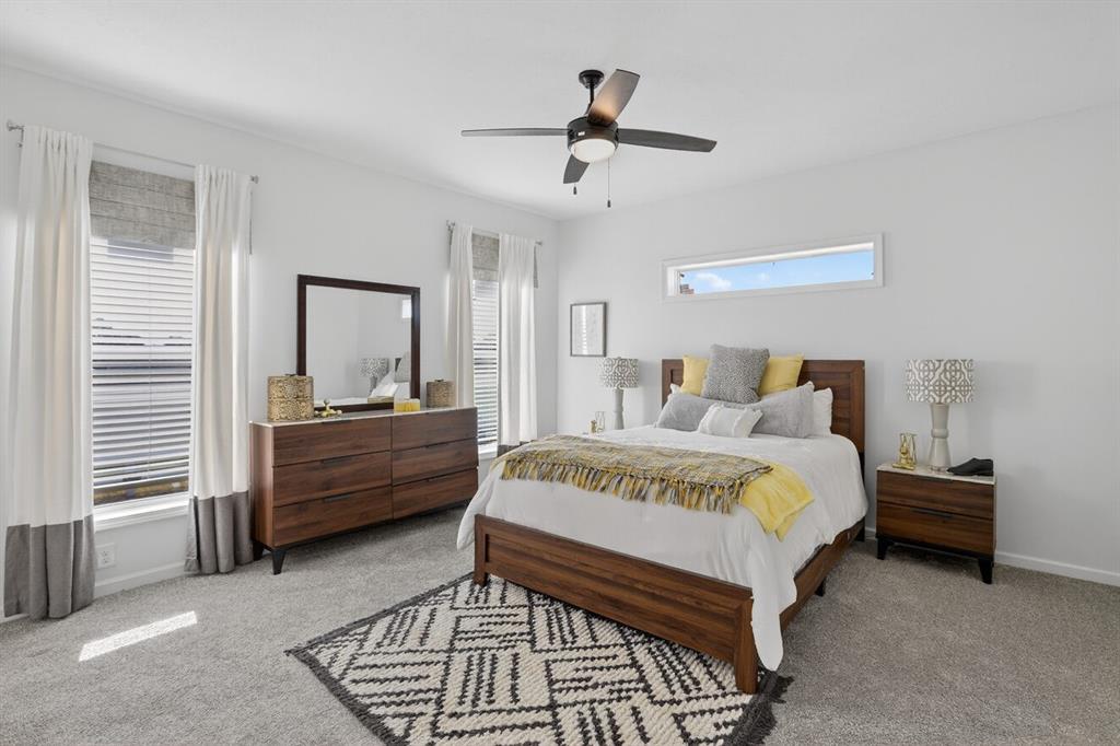 204 Doss Lane Moody, TX 76557 - Photo 11 of 19 a spacious bedroom with a bed a window and a dresser