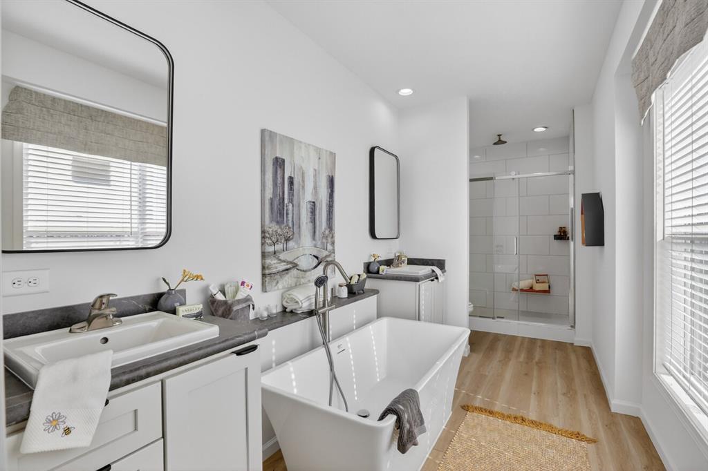 204 Doss Lane Moody, TX 76557 - Photo 12 of 19 a bathroom with a tub sink and mirror