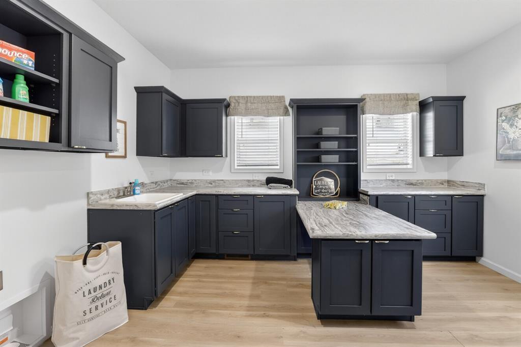 204 Doss Lane Moody, TX 76557 - Photo 15 of 19 a kitchen with a stove a sink and a microwave