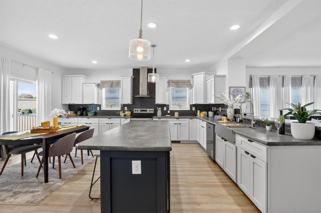 204 Doss Lane Moody, TX 76557 - Photo 7 of 19 a kitchen with counter top space appliances and a center island