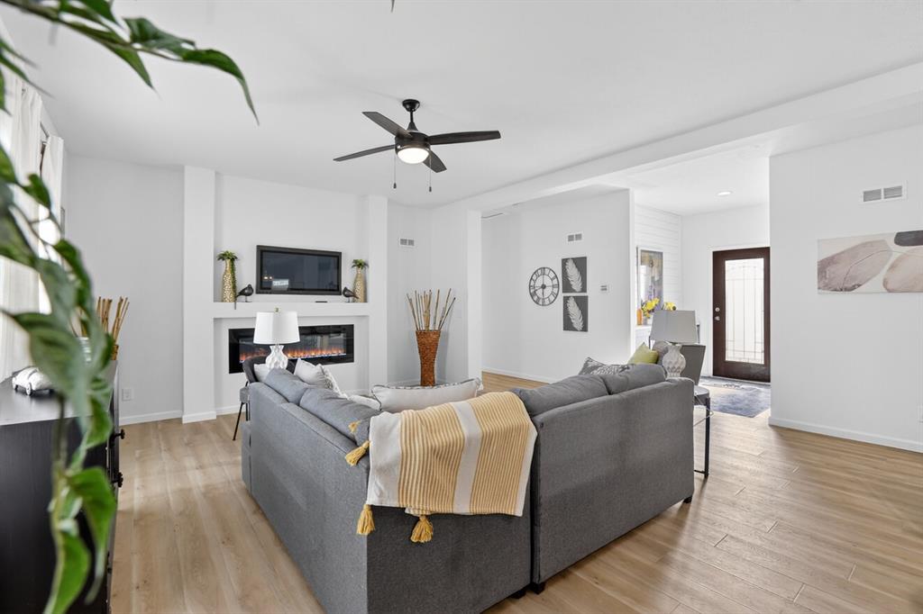 204 Doss Lane Moody, TX 76557 - Photo 9 of 19 a living room with furniture a fireplace and a flat screen tv