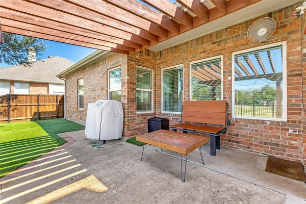 a building outdoor space with patio furniture