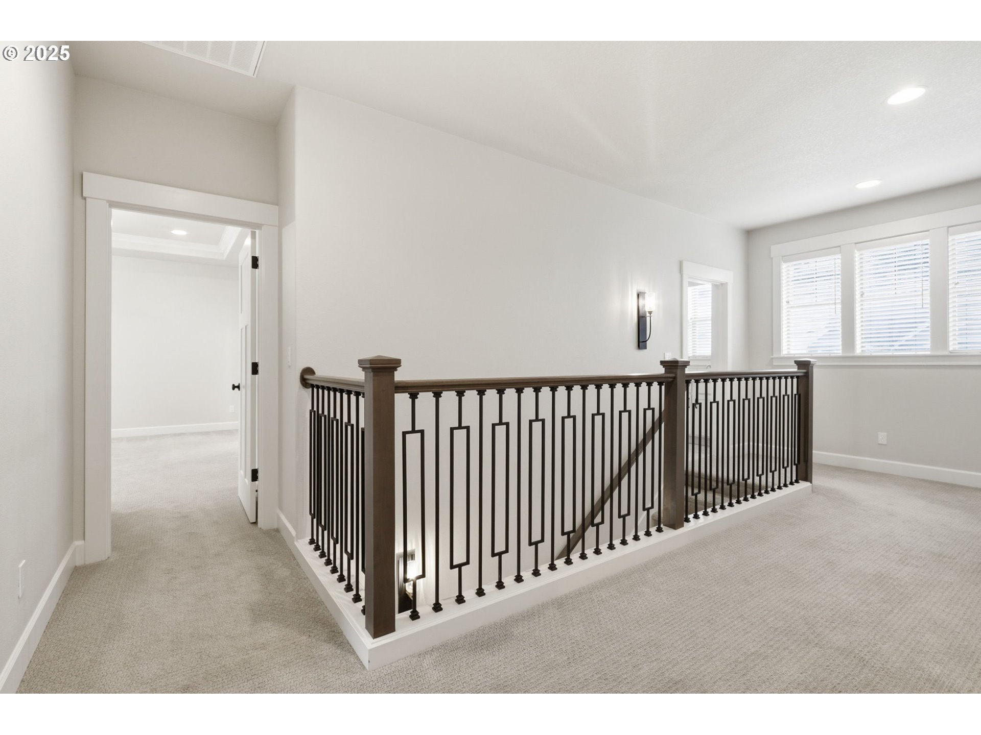 11936 Skellenger Way Oregon City, OR 97045 - Photo 11 of 32 a view of a hallway to a livingroom with stair