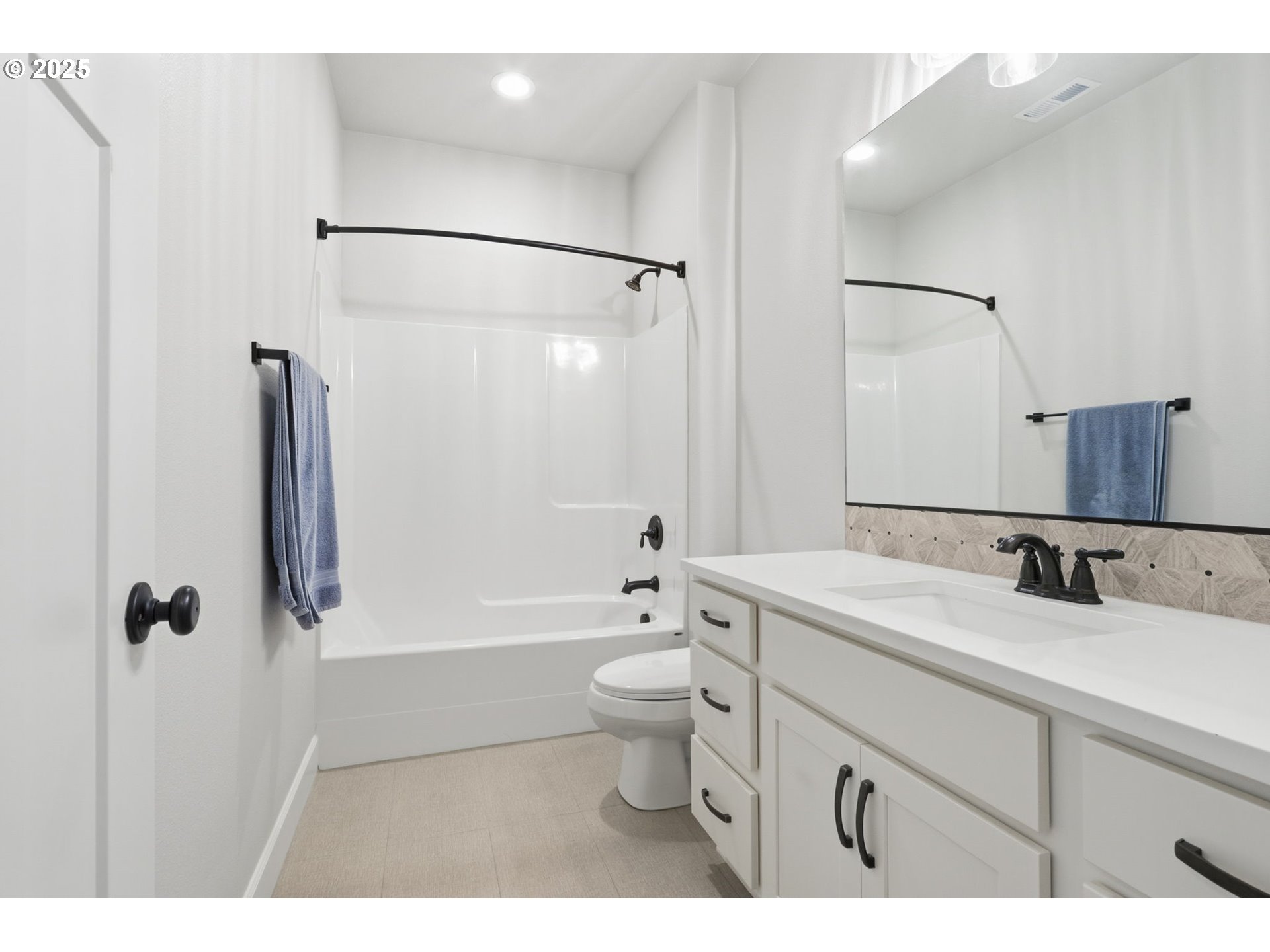 11936 Skellenger Way Oregon City, OR 97045 - Photo 20 of 32 a bathroom with a sink a toilet and shower