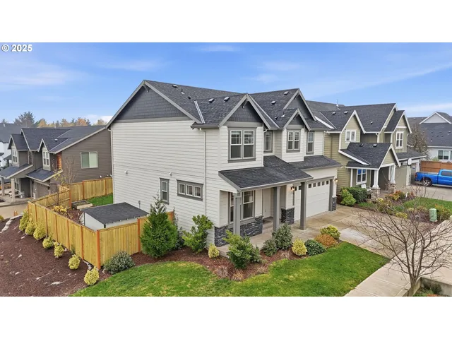 a aerial view of a house with a garden