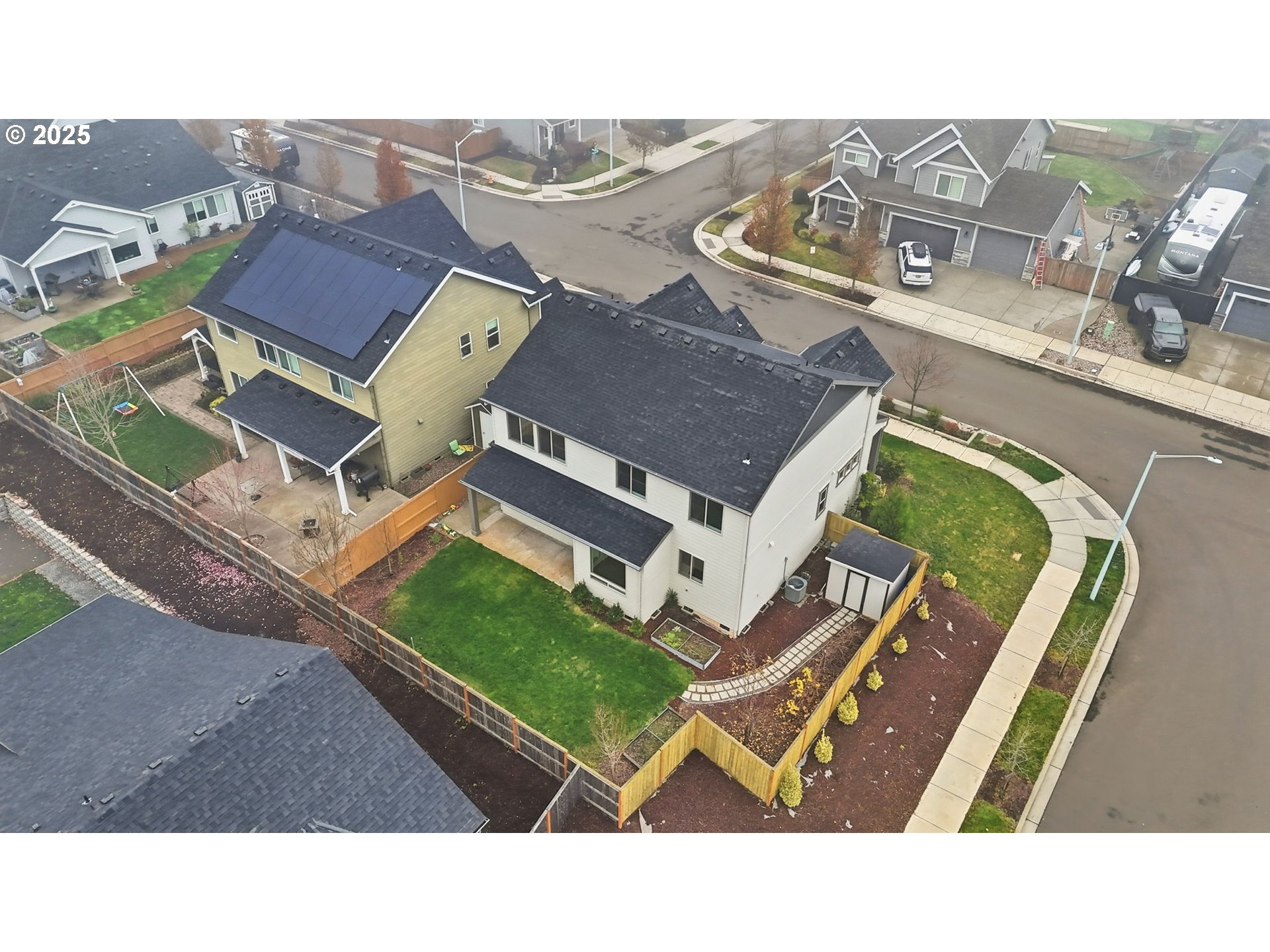 11936 Skellenger Way Oregon City, OR 97045 - Photo 29 of 32 a aerial view of a house with a garden