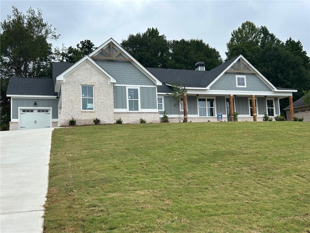 956 Wind Dance Court Demorest, GA 30535 - Photo 1 of 1 a front view of a house with garden
