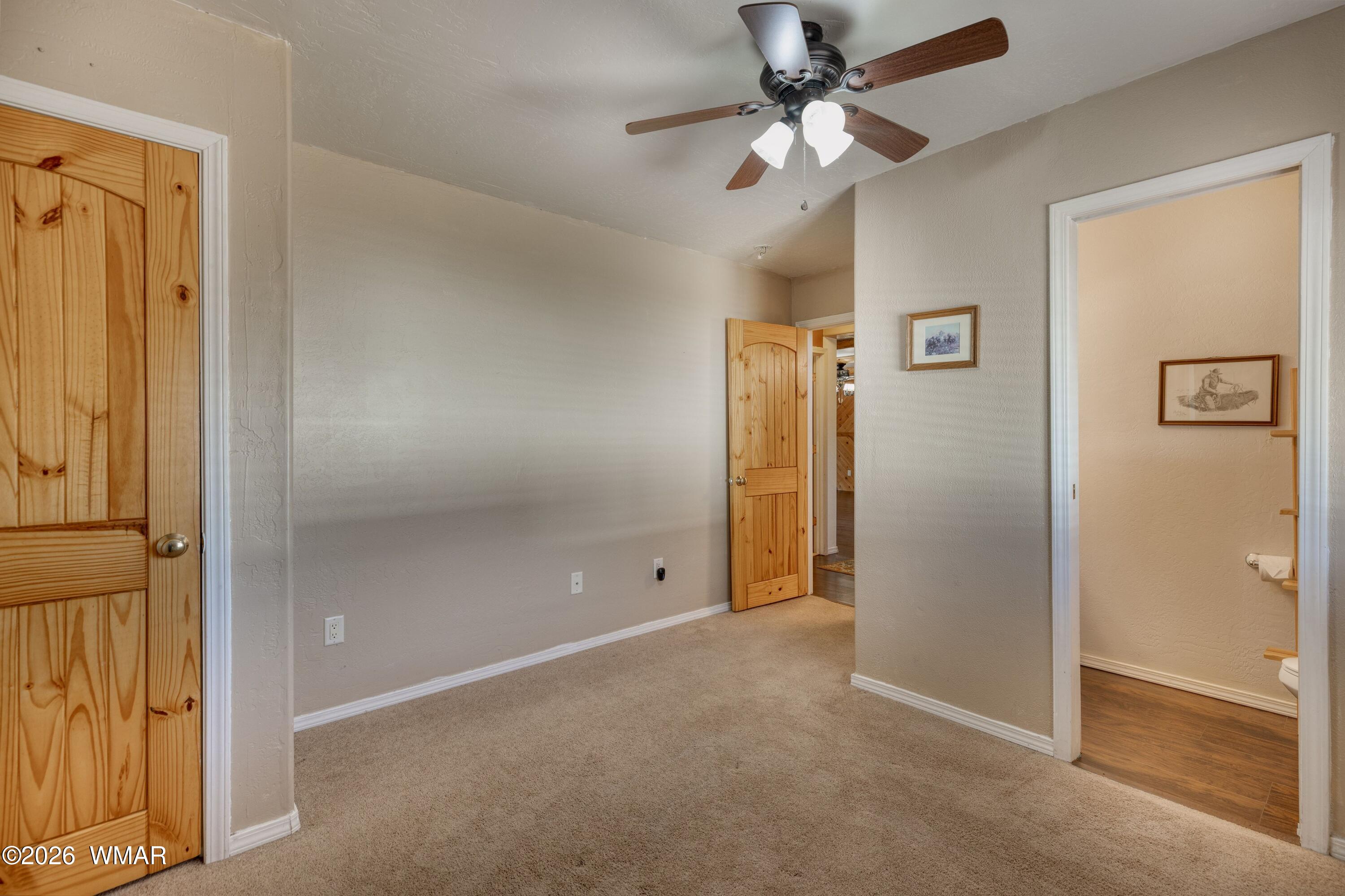2722 Bain Trail Overgaard, AZ 85933 - Photo 9 of 28 wooden floor in an empty room