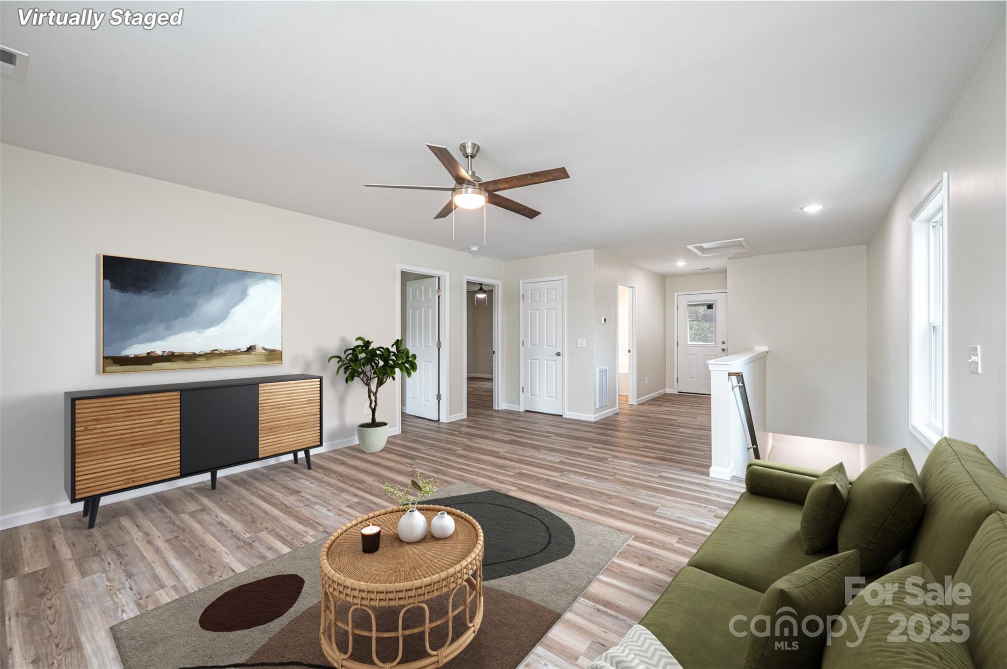 1214 Winter Place Lenoir, NC 28645 - Photo 11 of 19 a living room with furniture and a wooden floor