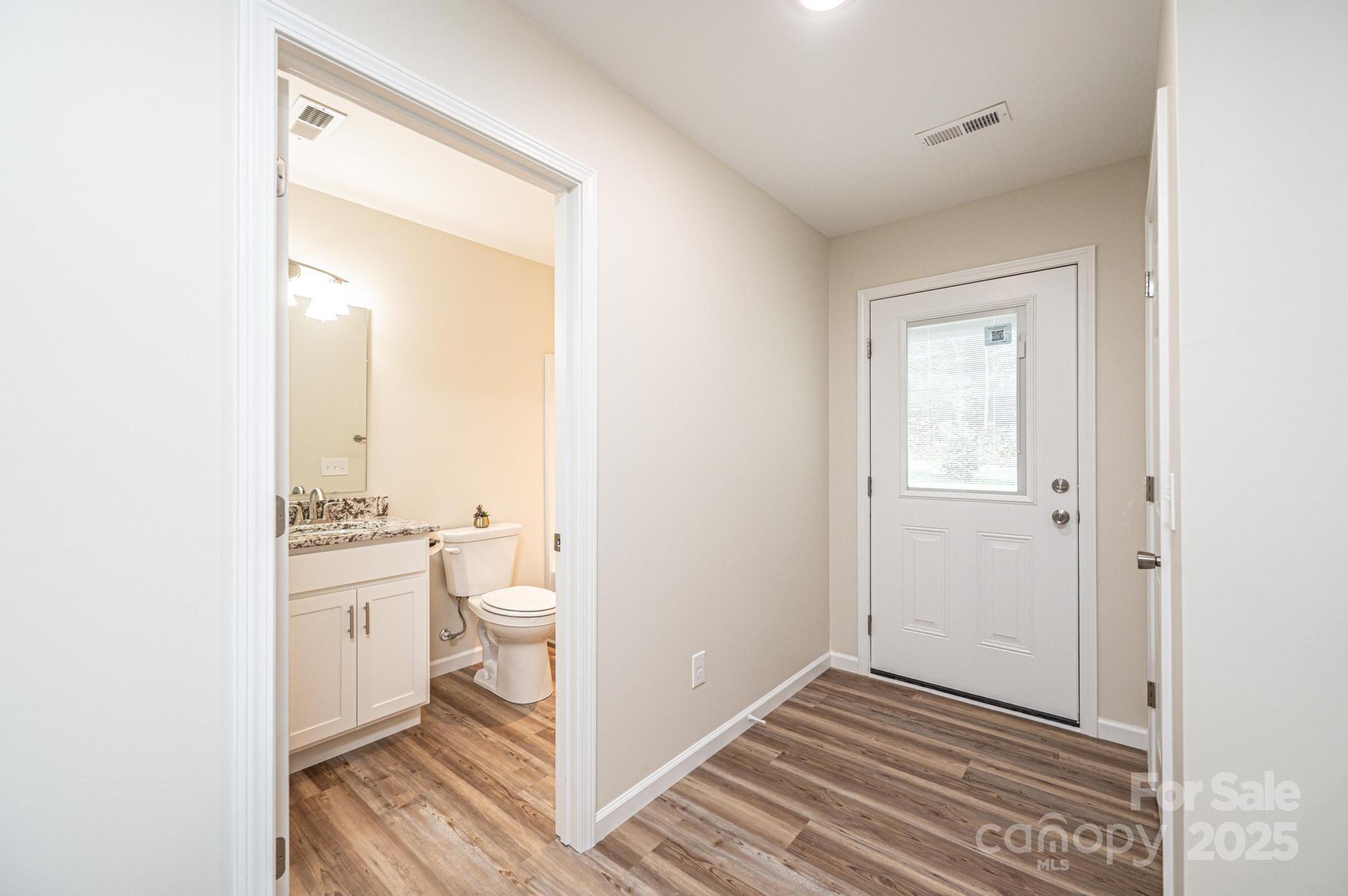 1214 Winter Place Lenoir, NC 28645 - Photo 16 of 19 a view of a bathroom with a sink and a mirror