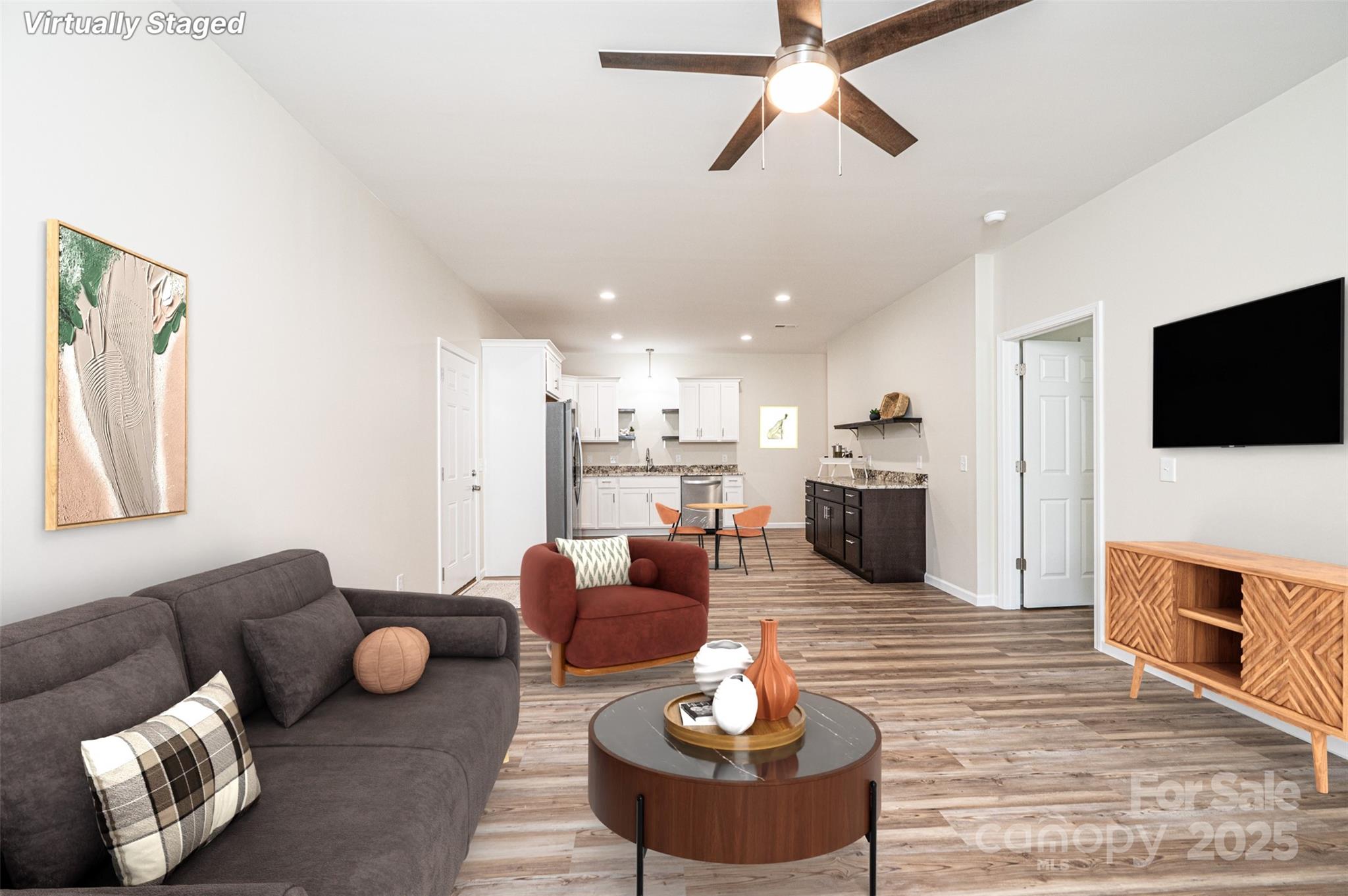 1214 Winter Place Lenoir, NC 28645 - Photo 7 of 19 a living room with furniture and a flat screen tv