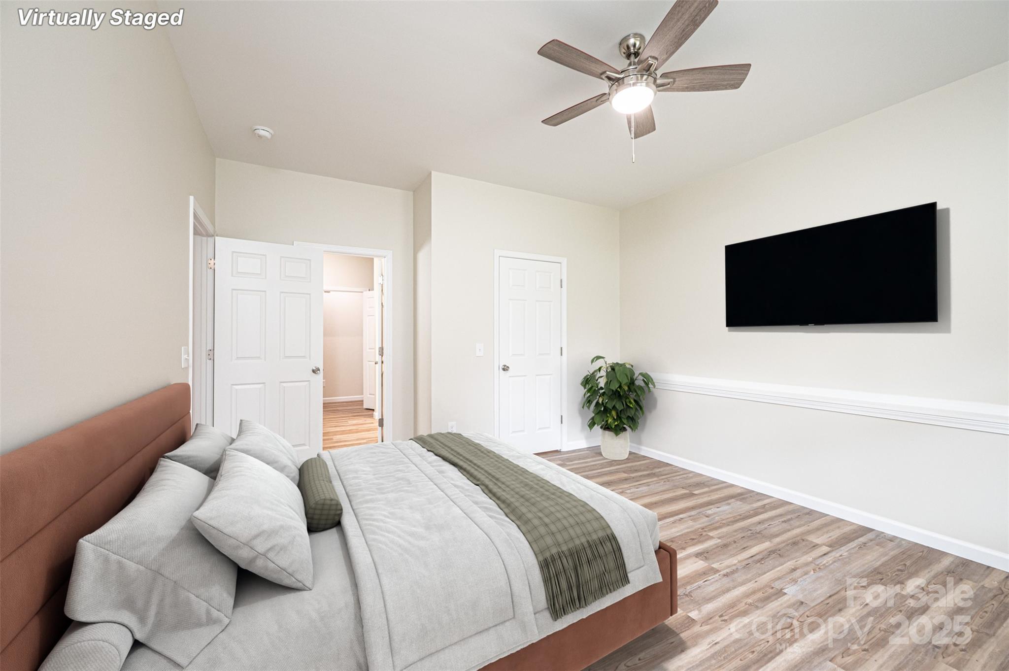 1214 Winter Place Lenoir, NC 28645 - Photo 8 of 19 a bedroom with a bed and a flat screen tv