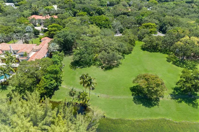 a view of a garden with a lake