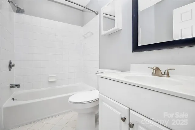 a bathroom with a sink a toilet and a bathtub