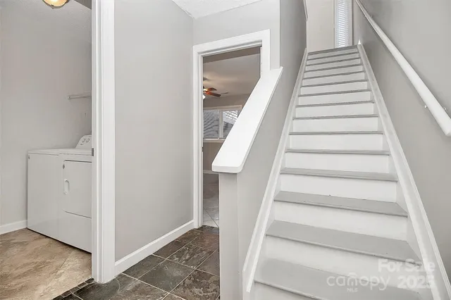a utility room with dryer and washer