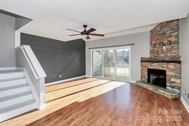 a bedroom with a bed and a fireplace