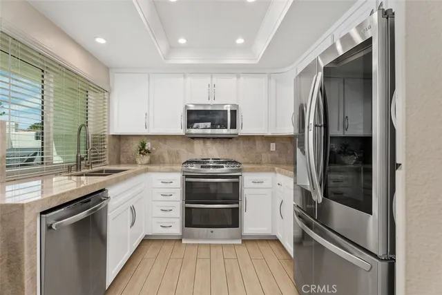 a view of washer and dryer in a utility room
