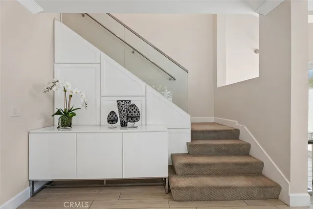 a view of kitchen with sink and cabinets