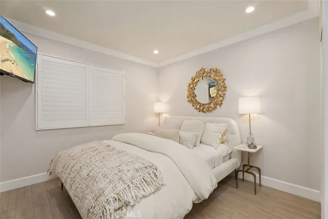 a bathroom with a granite countertop toilet a sink and a mirror