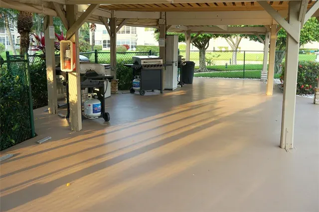 a view of a porch with seating space