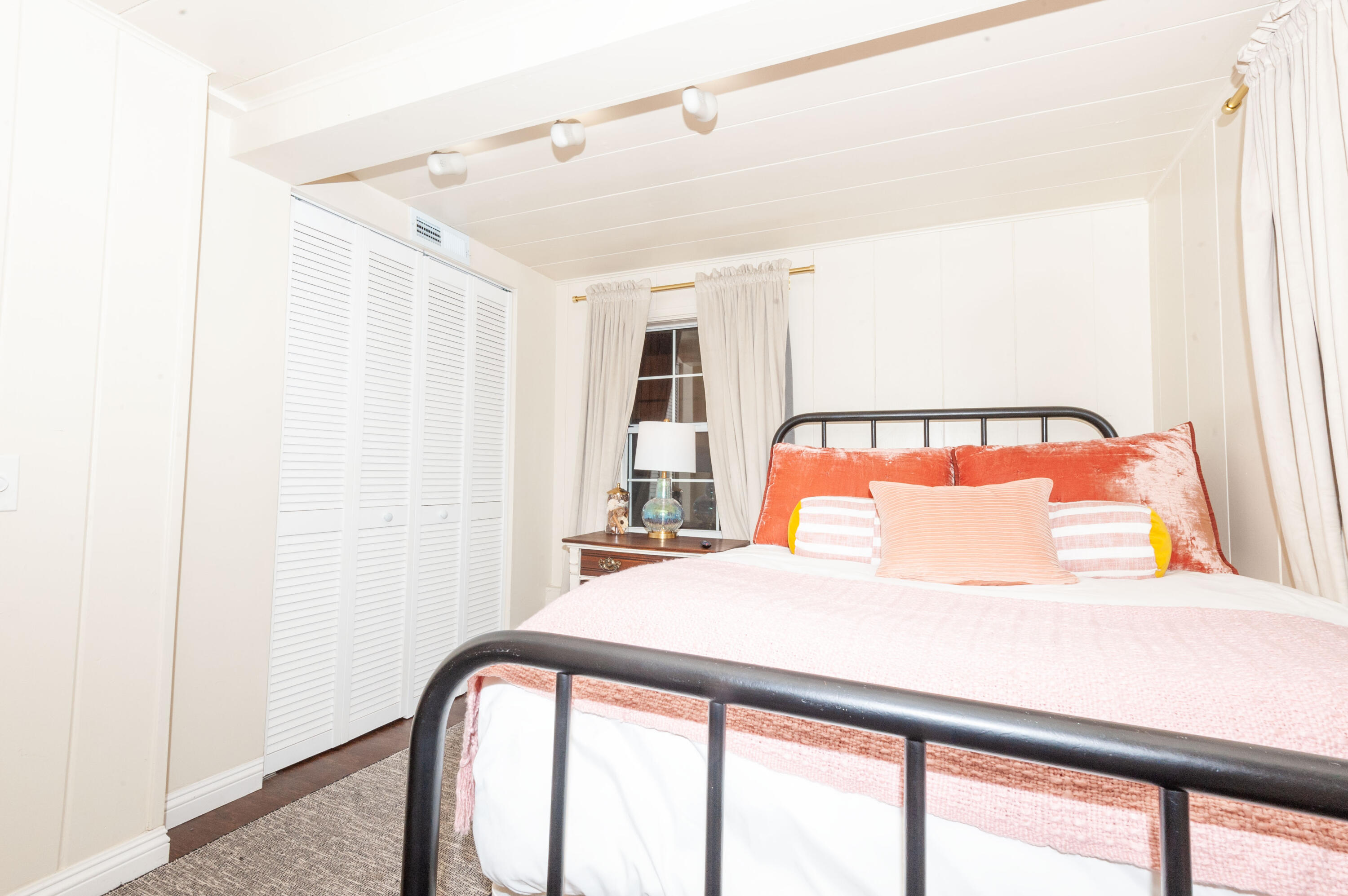 644 Cedar Lane Twin Peaks, CA 92391 - Photo 24 of 41 a bedroom with a bed and a large window