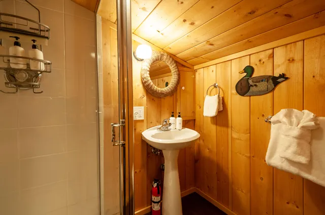 a bathroom with a sink and mirror