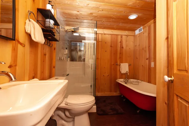 a bathroom with a sink and toilet