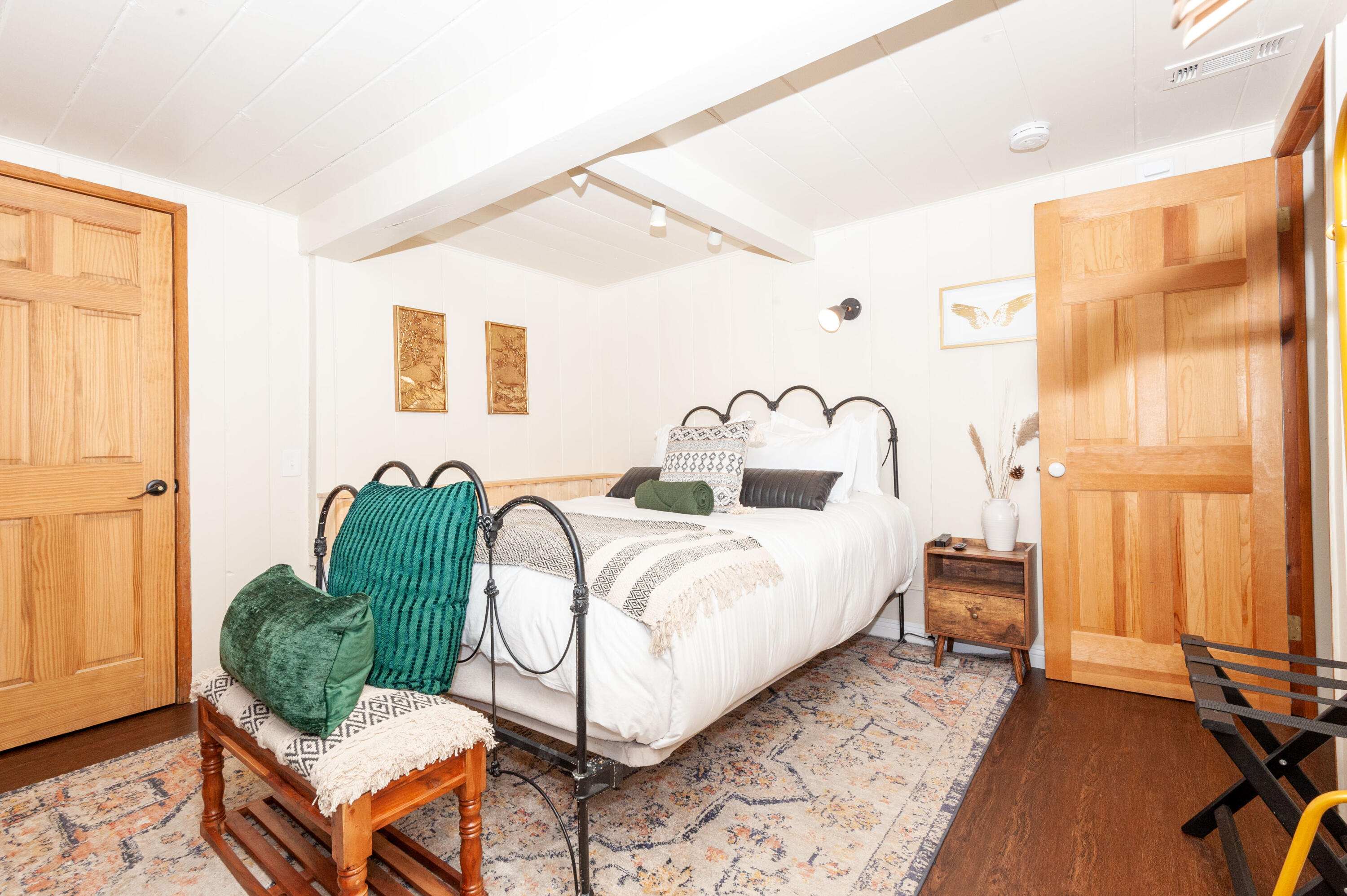 644 Cedar Lane Twin Peaks, CA 92391 - Photo 29 of 41 a bedroom with a bed and wooden floor