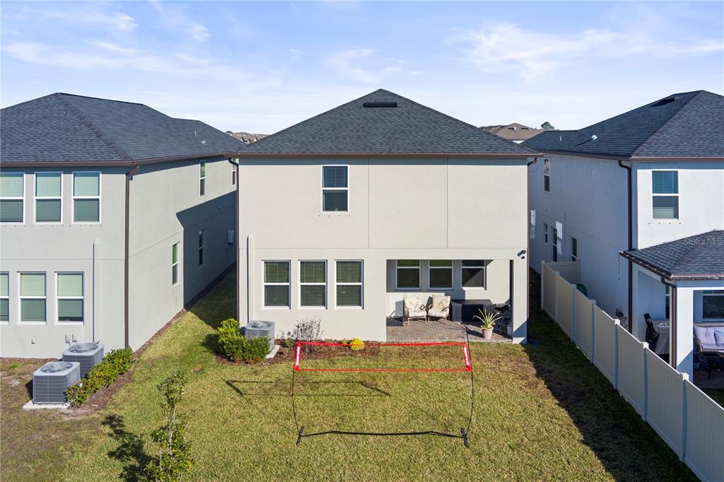 8280 Rolling Tides Drive New Port Richey, FL 34655 - Photo 46 of 49 front view of a house with a yard