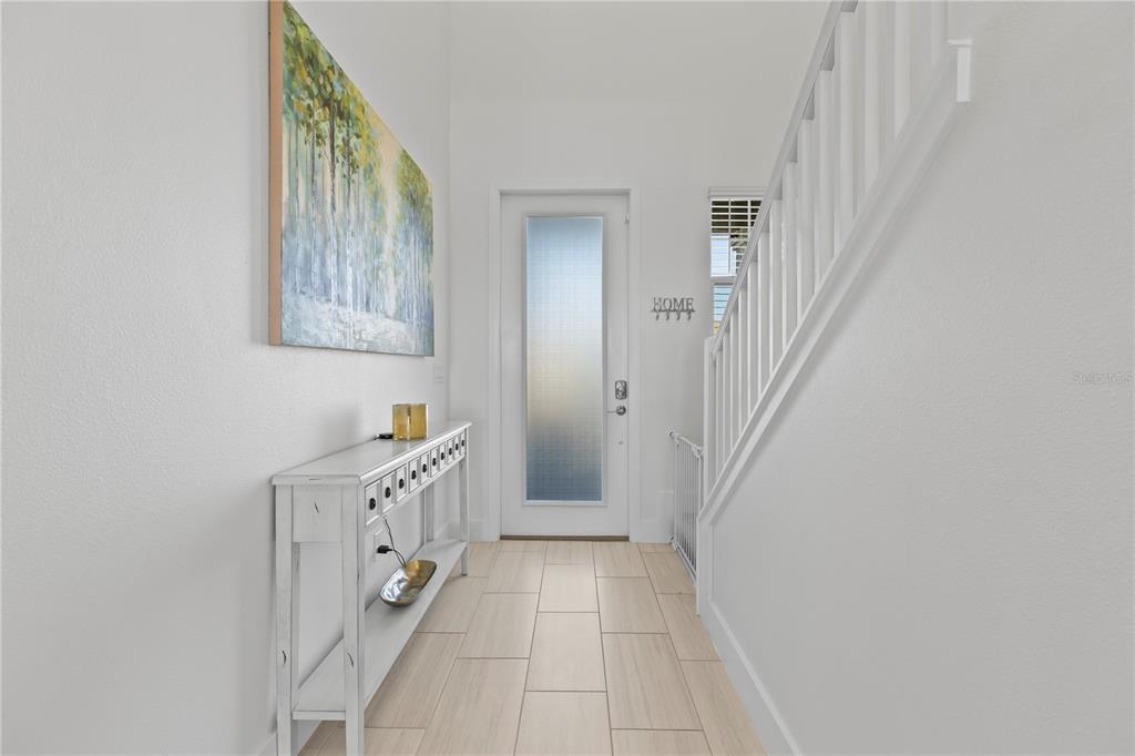 8280 Rolling Tides Drive New Port Richey, FL 34655 - Photo 5 of 49 a hallway with cabinets