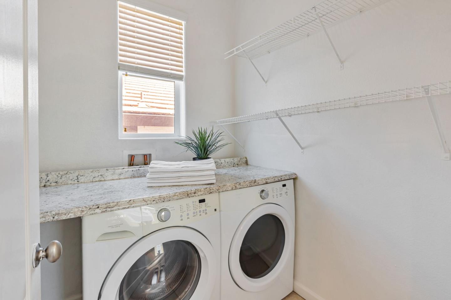 8940 Acorn Way Gilroy, CA 95020 - Photo 12 of 20 a utility room with dryer and washer