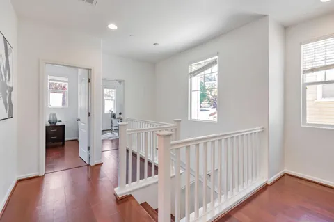 a view of entryway with wooden floor