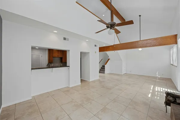 a view of a livingroom with a ceiling fan