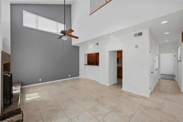 a view of a livingroom with a ceiling fan