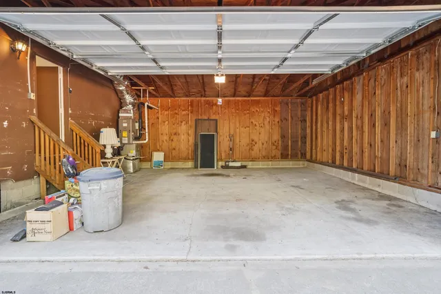a view of a room with wooden walls