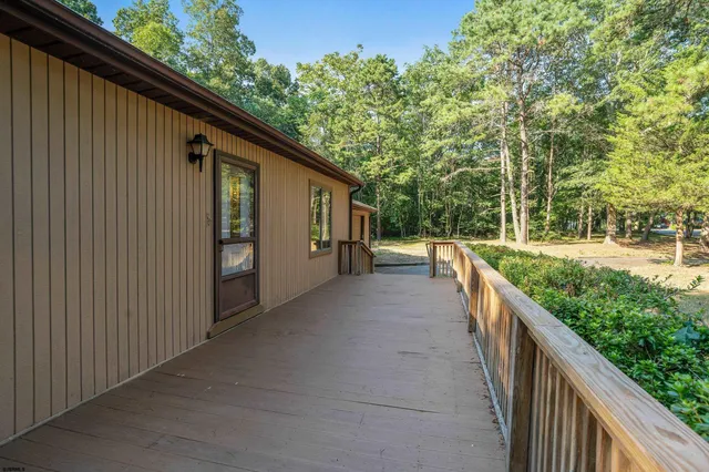 a view of a pathway with a wrought iron stairs