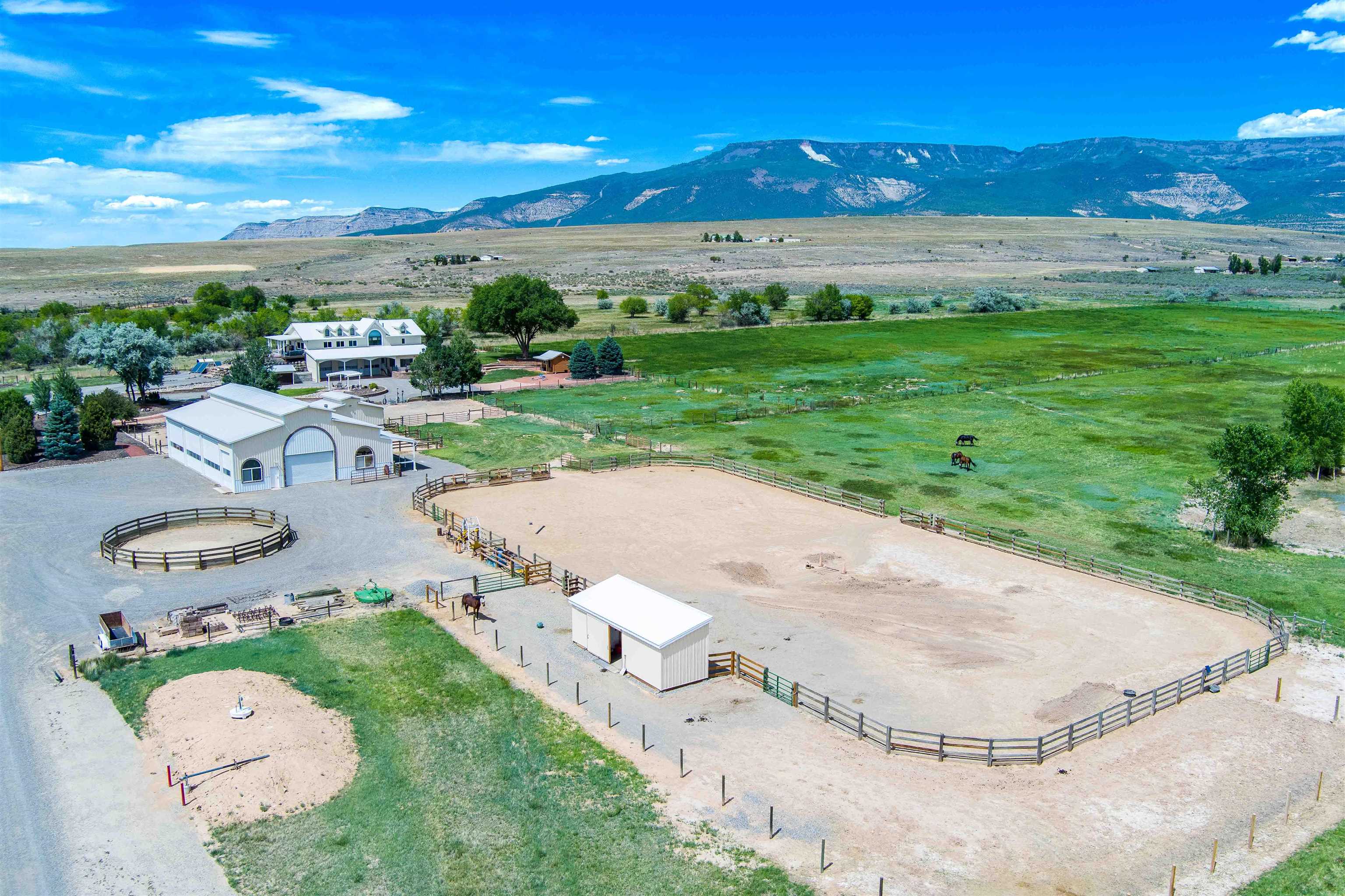 6800 Reeder Mesa Road Whitewater, CO 81527 - Photo 1 of 17 an aerial view of a house with outdoor space and street view
