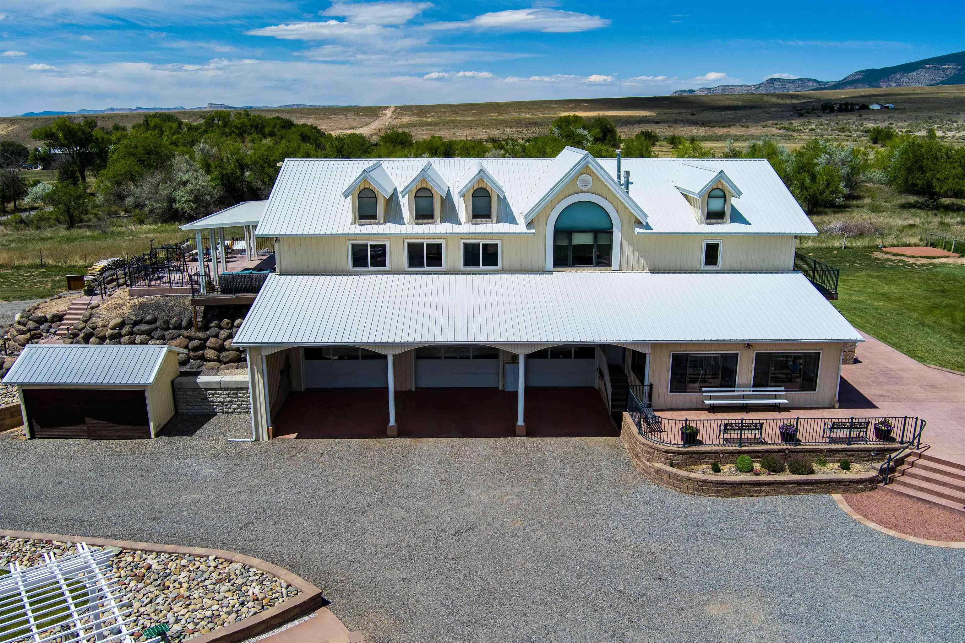 6800 Reeder Mesa Road Whitewater, CO 81527 - Photo 3 of 17 a view of multiple houses with a outdoor space