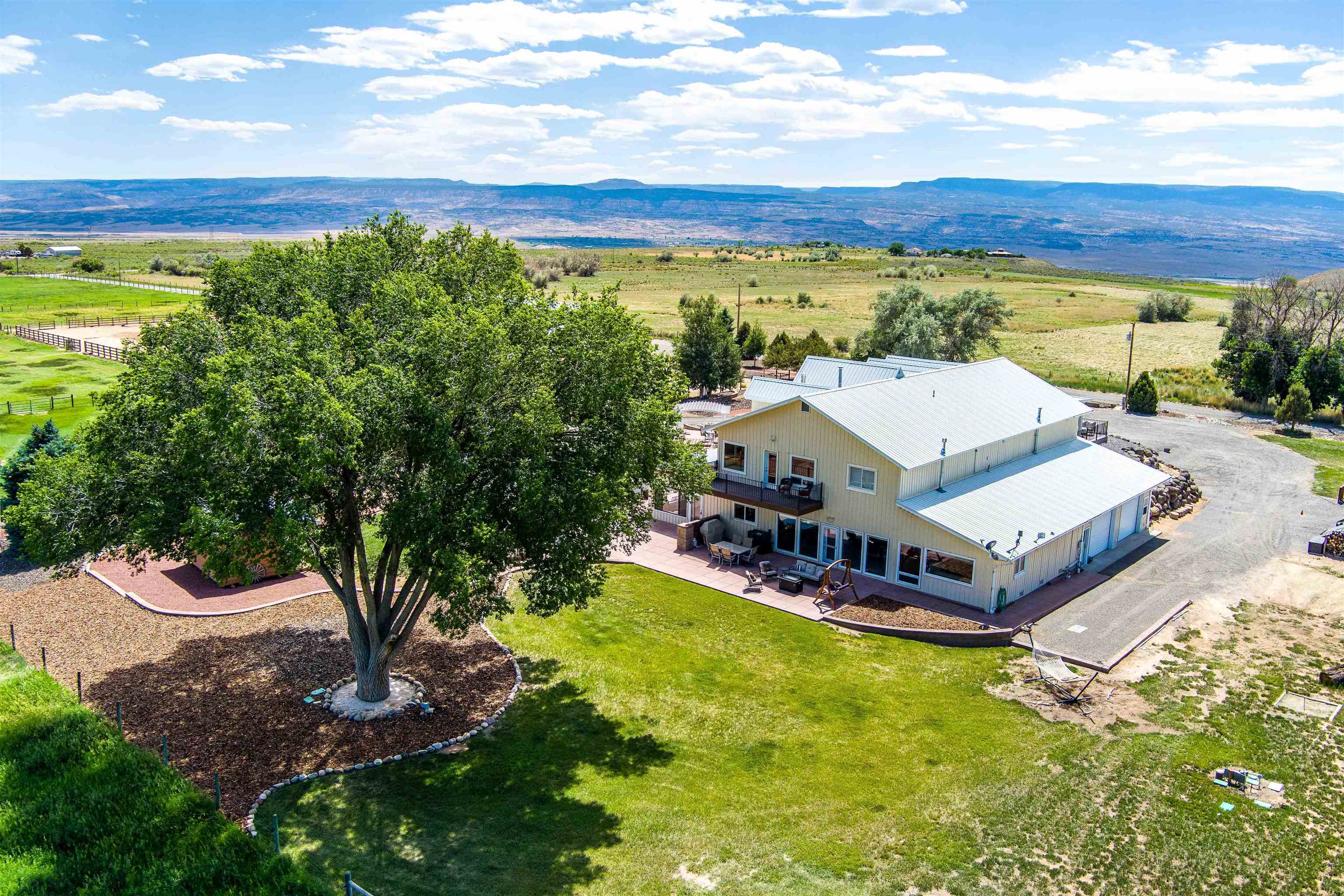 6800 Reeder Mesa Road Whitewater, CO 81527 - Photo 4 of 17 a view of a terrace with a yard