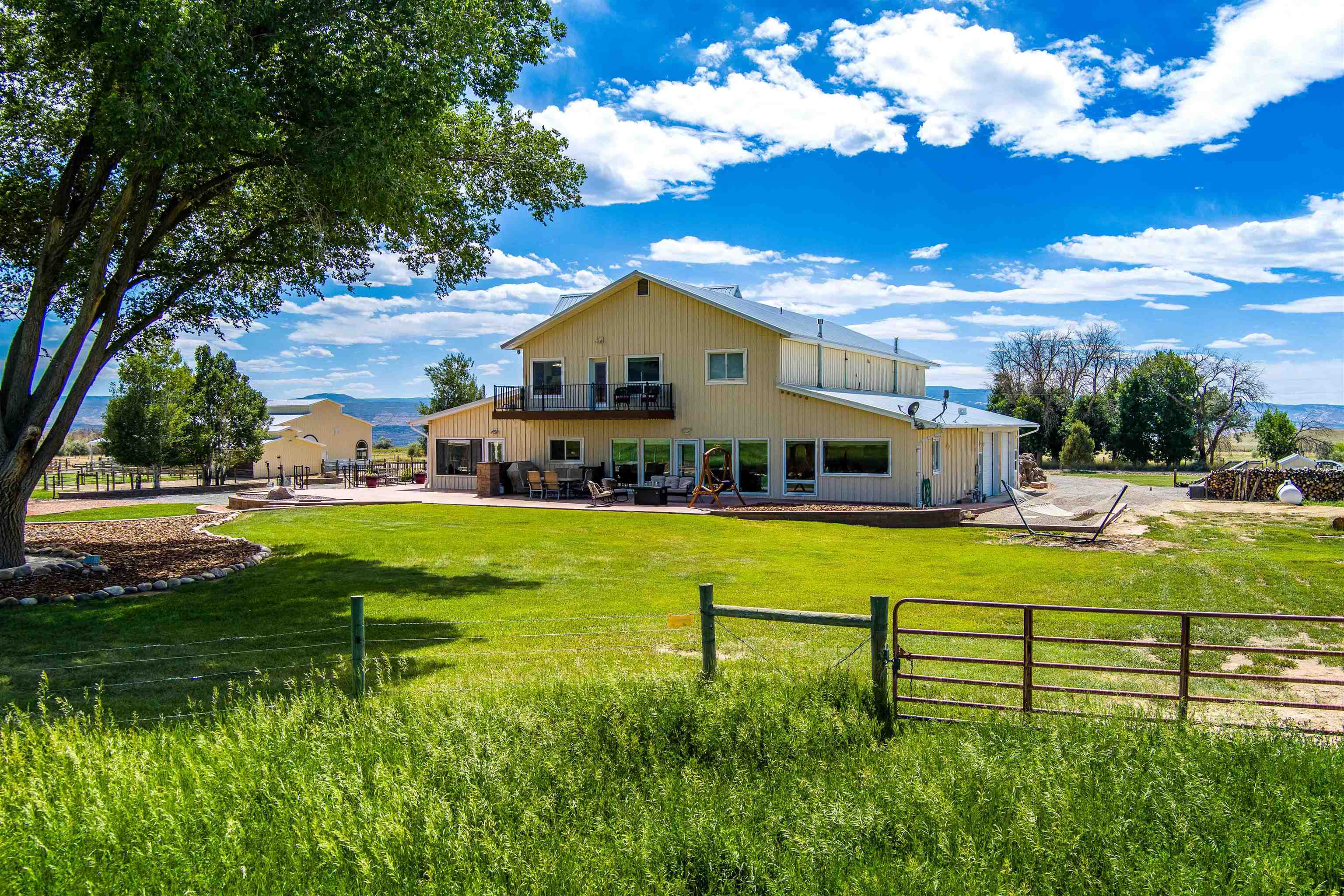 6800 Reeder Mesa Road Whitewater, CO 81527 - Photo 6 of 17 a front view of house with yard and green space