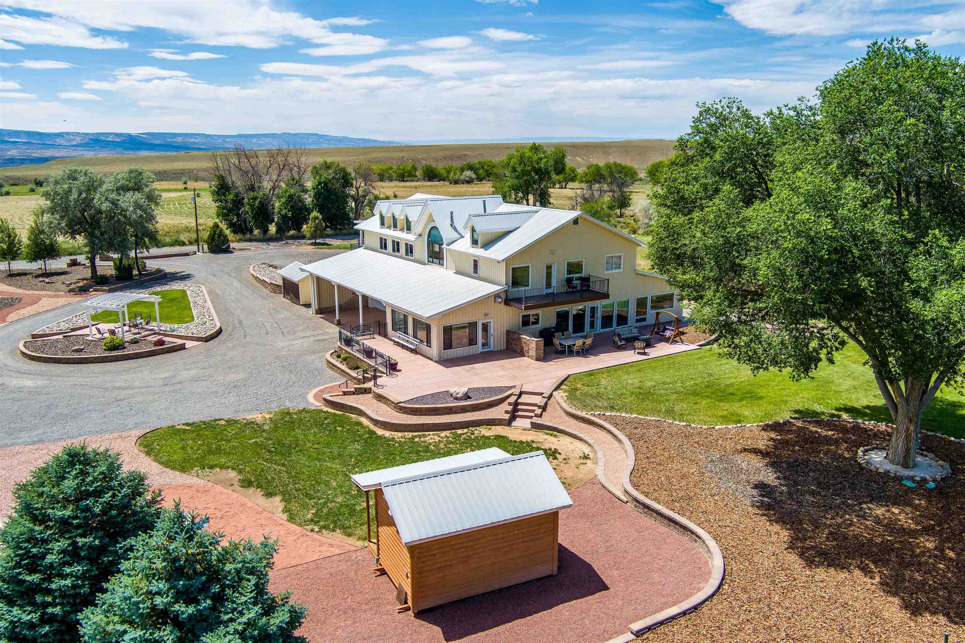 6800 Reeder Mesa Road Whitewater, CO 81527 - Photo 9 of 17 an aerial view of a house with swimming pool garden and patio