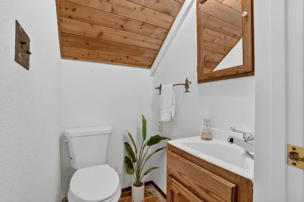 a bathroom with a sink and toilet