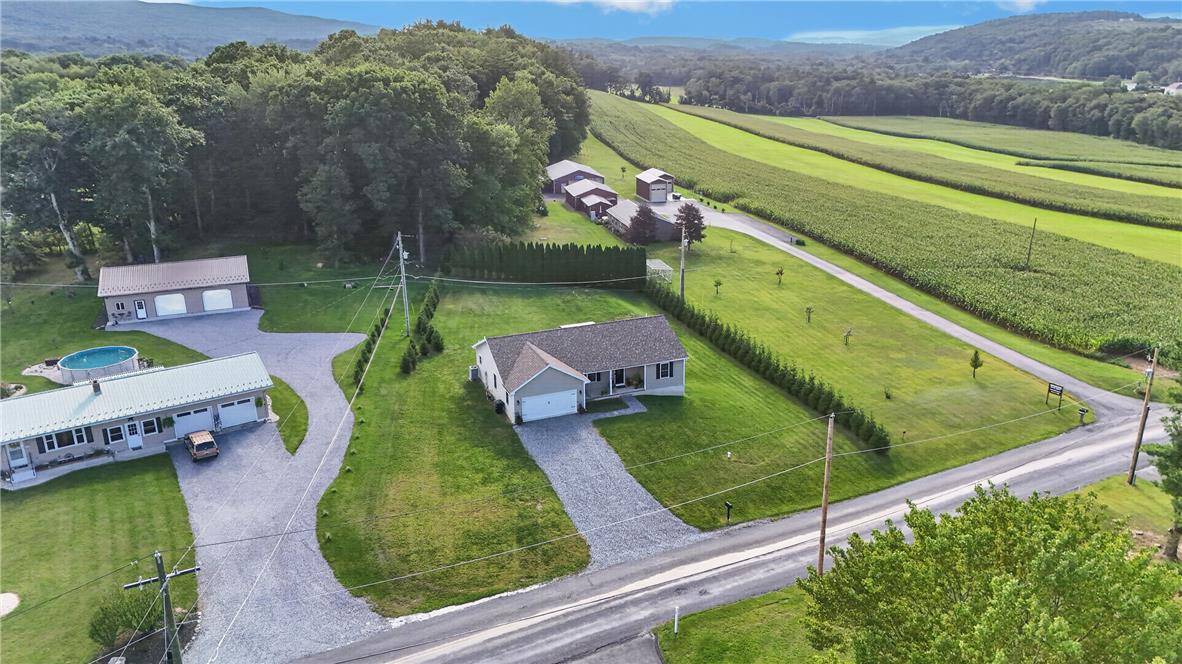 74 Kepners Road New Ringgold, PA 17960 - Photo 73 of 79 Rolling hills and vast green fields frame this peaceful country property with multiple detached garages.