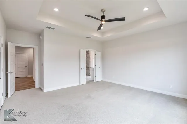 a utility room with sink dryer and washer