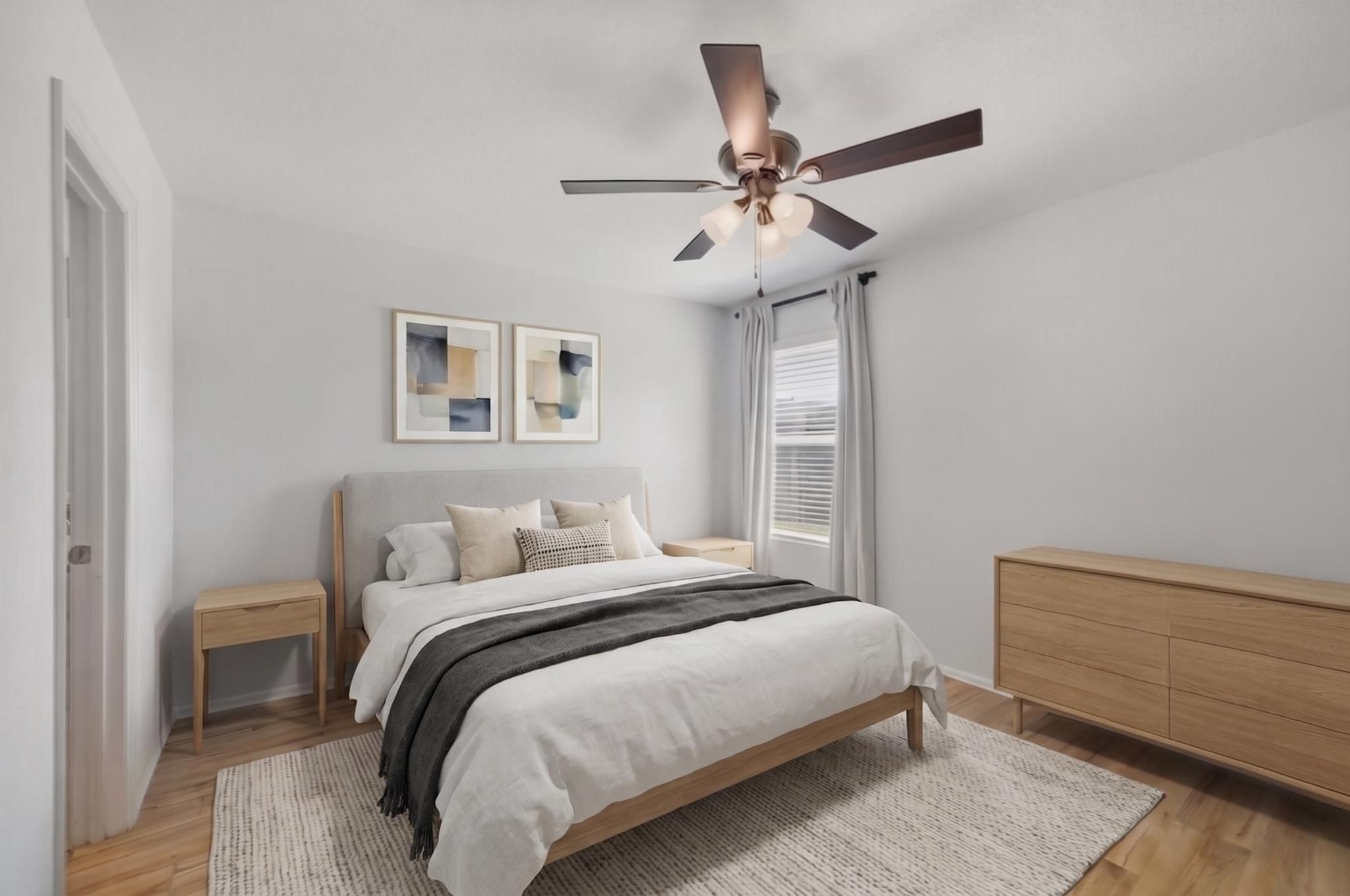 14502 Woodcott Warren Way Rosharon, TX 77583 - Photo 27 of 37 Primary Bedroom—virtually staged to showcase layout and scale, offering a spacious and relaxing retreat.
