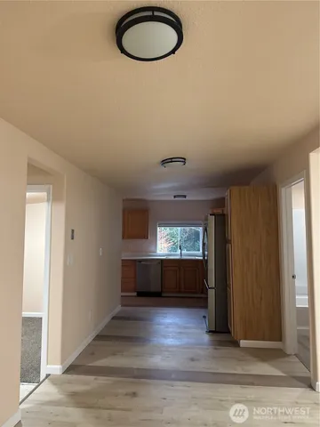 a view of livingroom and hardwood floor