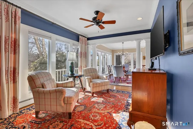 a room with furniture and a rug