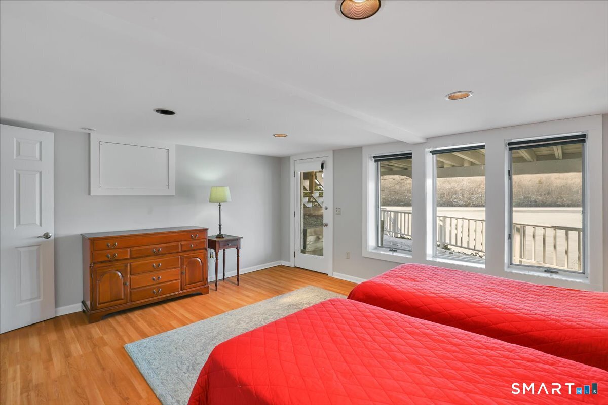 7 Point Comfort Road Waterford, CT 06385 - Photo 28 of 40 Lower level bedroom with patio