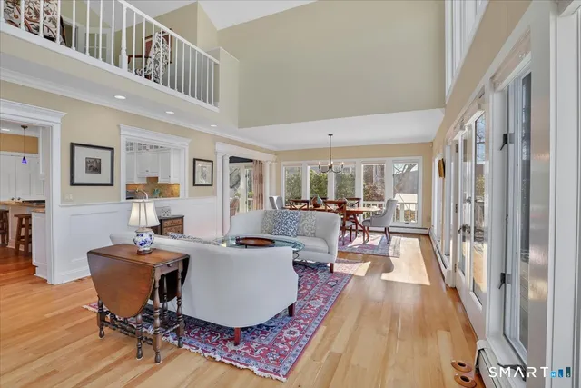 a living room with furniture and a rug