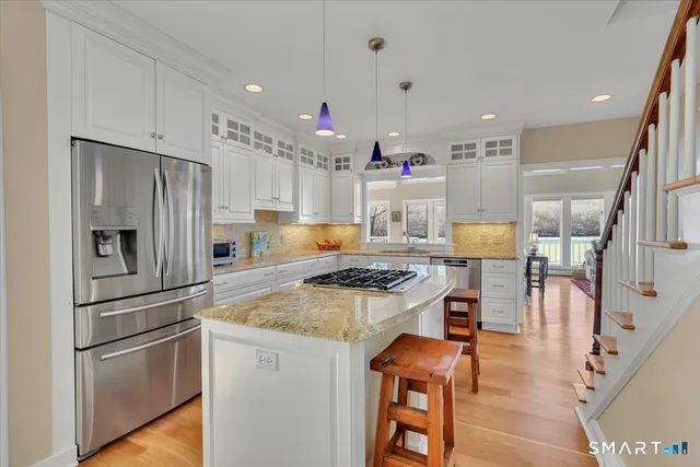 a kitchen with a stove and a sink